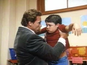 Arnold Schwarzenegger abusing a kid