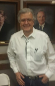 Savoring victory in a bolo tie:  El Nido lead organizer Tom Perrin.